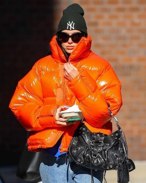 Dua Lipa’s Orange Puffer Jacket