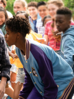 Brett-Sampson-Film-13-The-Musical-2022-JD-McCrary-Blue-Letterman-Jacket